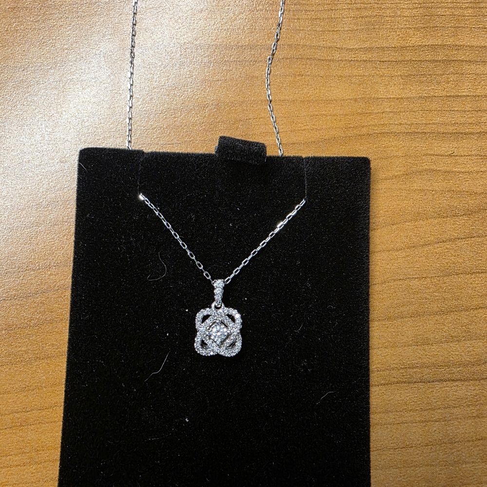 White Gold And Diamond Love Knot Necklace